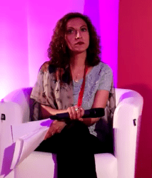 Jineth Bedoya Lima speaking at Coalico, Global Summit to End Sexual Violence in Conflict, 2014, yoga at yogalime